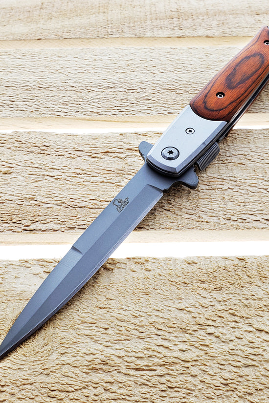 Falcon Wood Spring Assisted Pocket Knife with sleek design and durable stainless steel blade