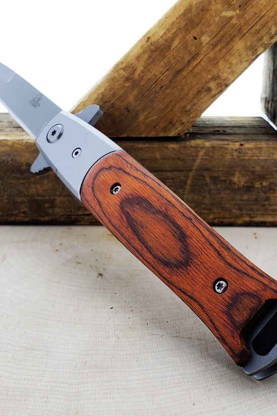 Falcon Wood Spring Assisted Pocket Knife with a sleek blade and stylish wooden handle