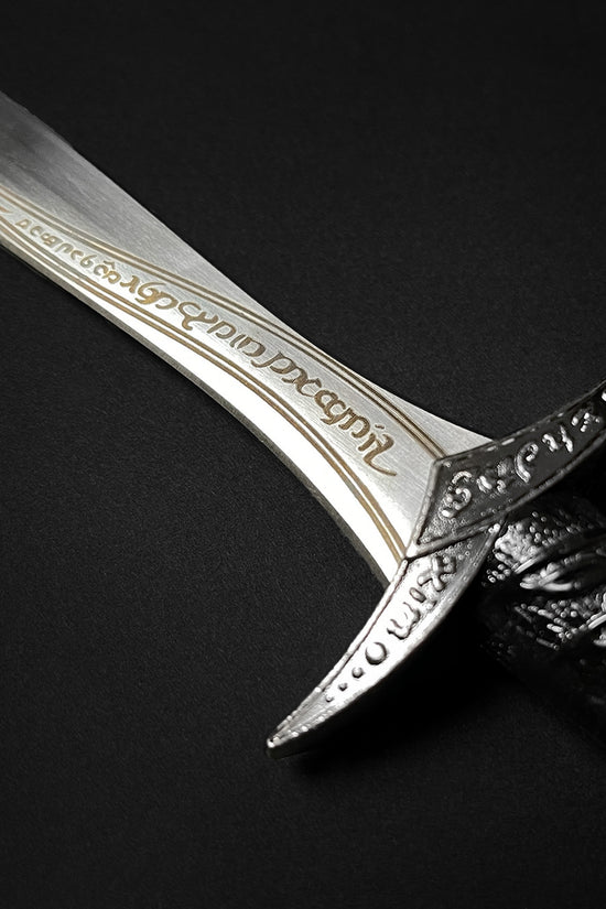 Guild Arms fantasy dagger for sale with detailed silver blade and black textured handle