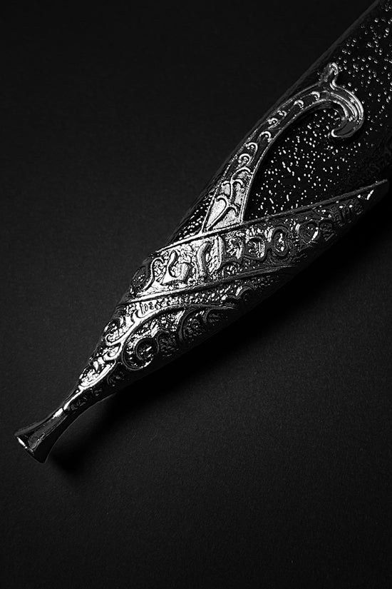 Decorative metal tip of Guild Arms fantasy dagger for sale with intricate engraved design