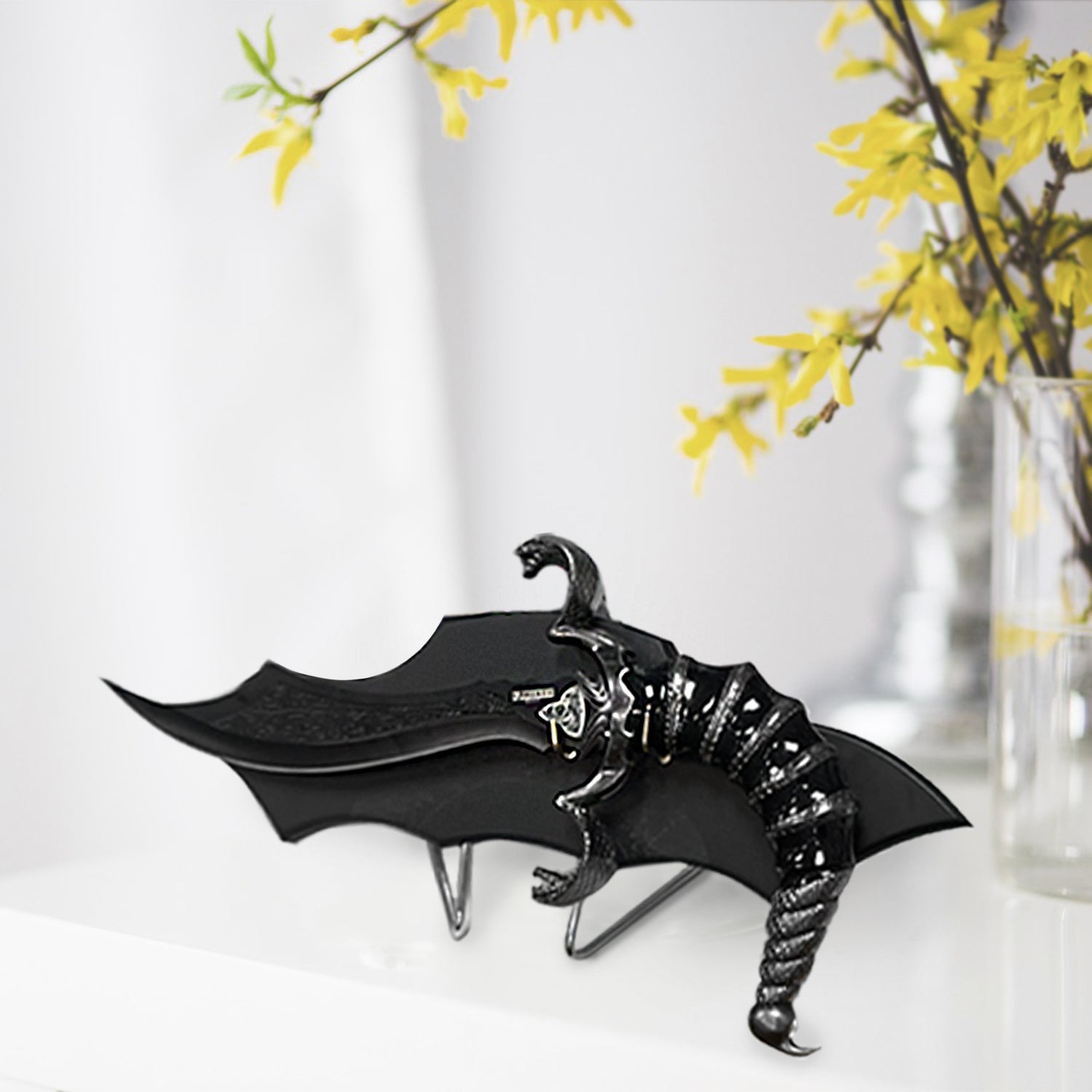 Fantasy Edge 12" Scorpion Dagger Curved Blade Scorpion Dagger W/ Stand displayed elegantly on a stand