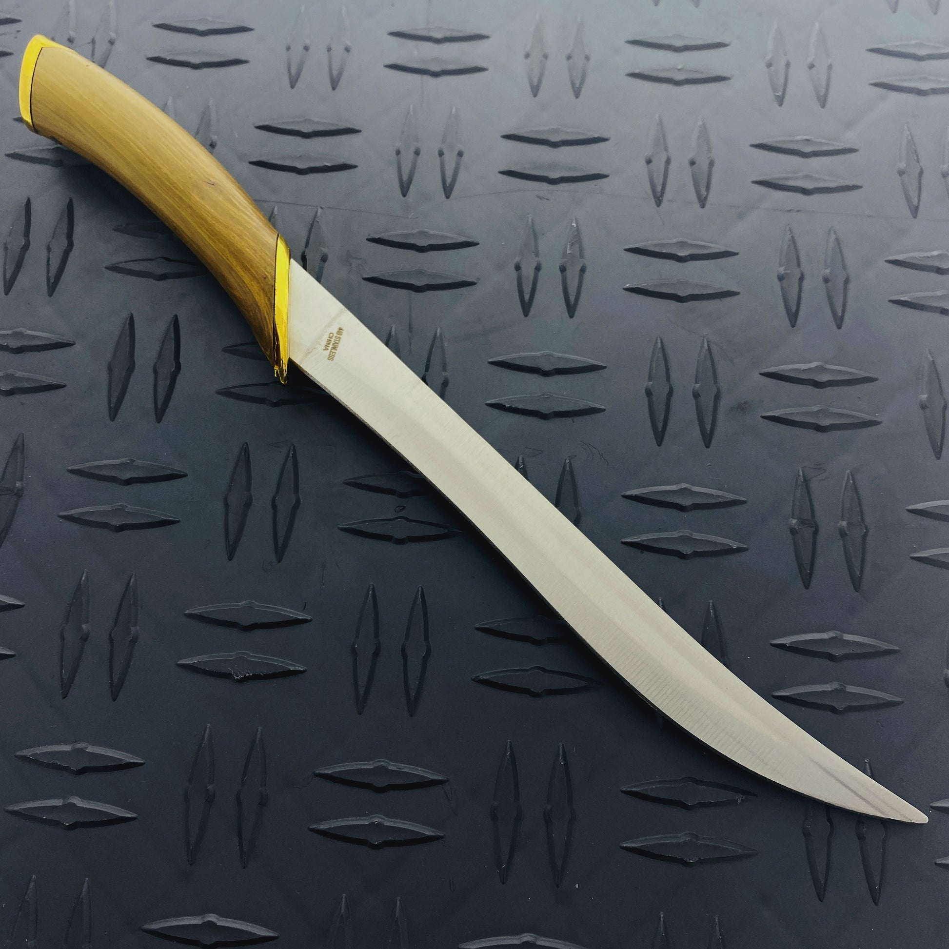 Guild Arms Fantasy Elvish Dagger with a curved blade and elegant wooden handle