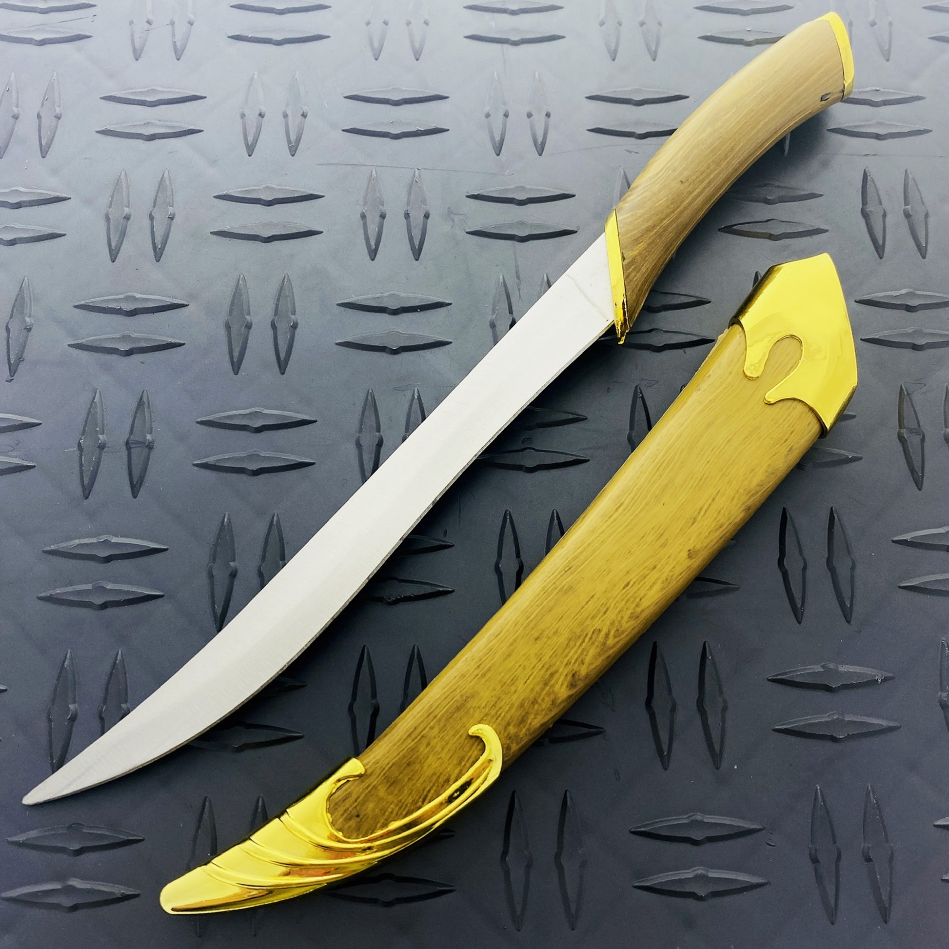 Guild Arms Fantasy Elvish Dagger with a curved blade and ornate gold accents on the handle