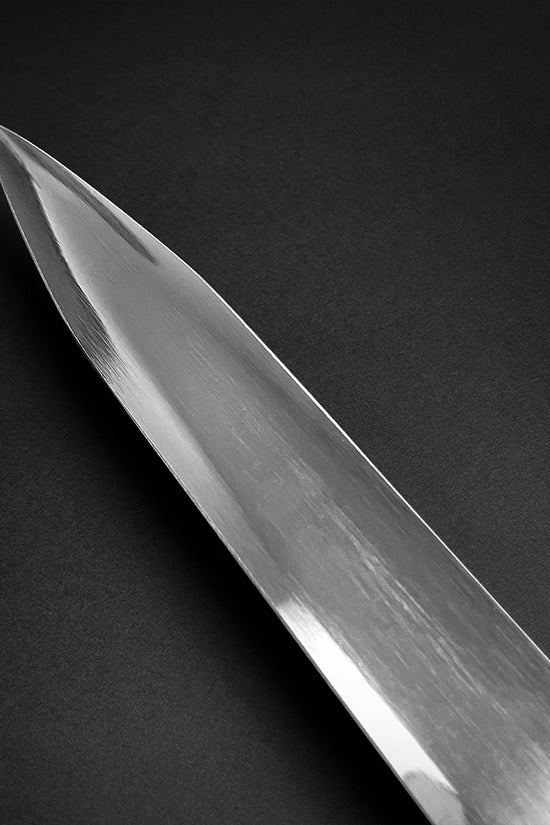 Close-up of a polished blade showcasing the craftsmanship of the Fantasy Medieval Sword from Guild Arms