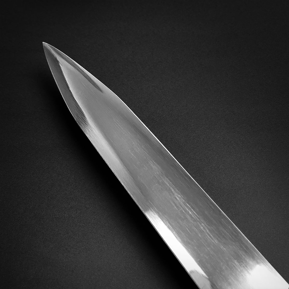 Close-up of a polished blade showcasing the craftsmanship of the Fantasy Medieval Sword from Guild Arms