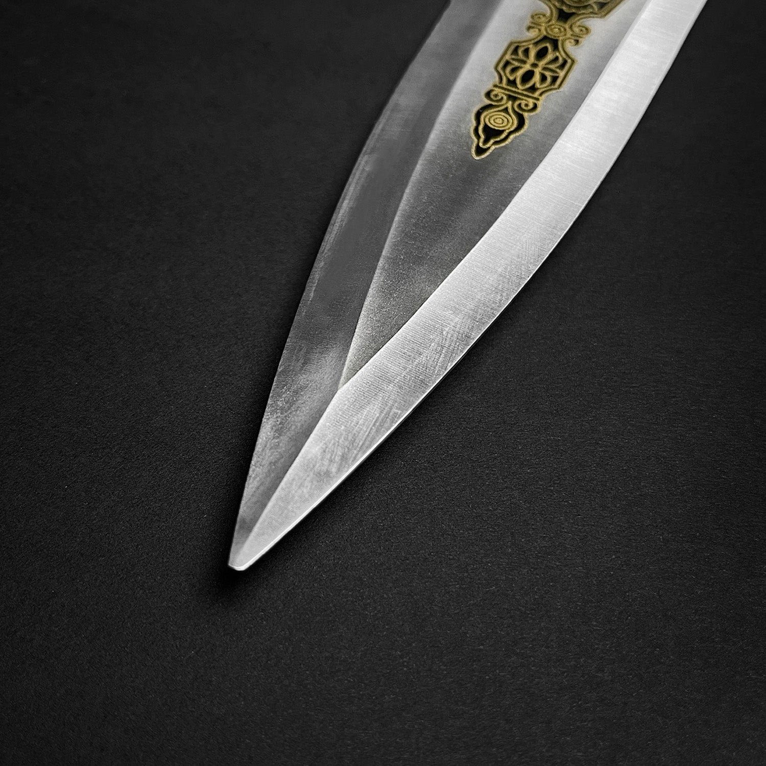 Close-up of a Fantasy Edge fantasy roman dagger for sale showcasing its intricate blade design