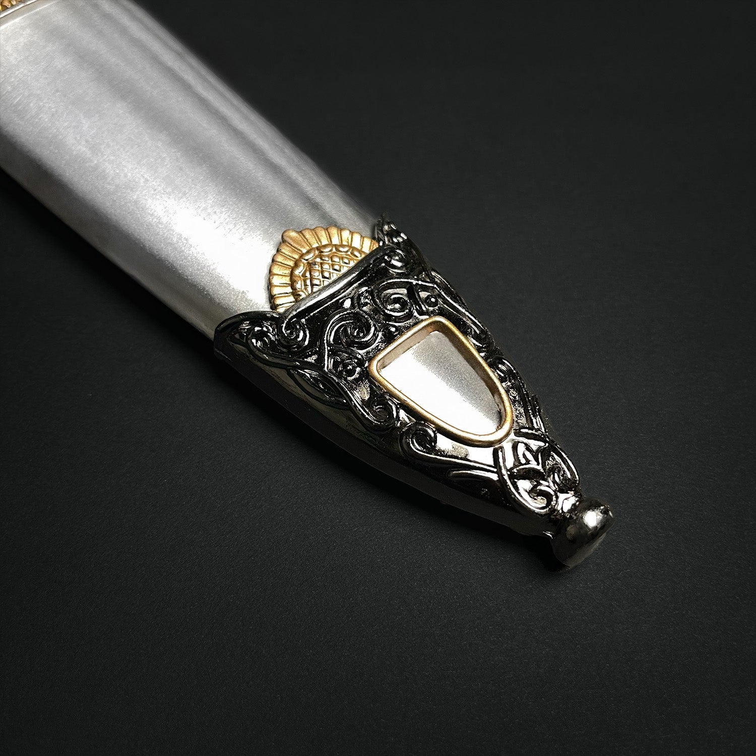 Close-up of a Fantasy Edge fantasy roman dagger for sale with ornate handle and detailed craftsmanship