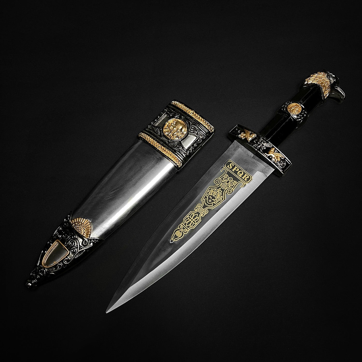 Intricately designed fantasy roman dagger for sale with ornate handle and detailed sheath