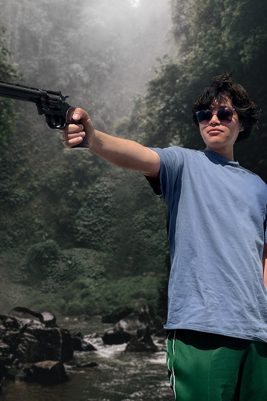 Guild Arms Foam Cosplay Revolver Gun held by a person in a natural setting with sunglasses