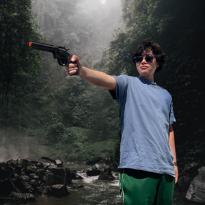 Guild Arms Foam Cosplay Revolver Gun held by a person in a natural setting with sunglasses