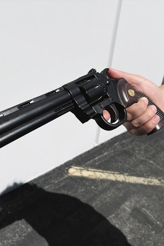Guild Arms Foam Cosplay Revolver Gun held in hand, perfect for anime-themed costumes and events