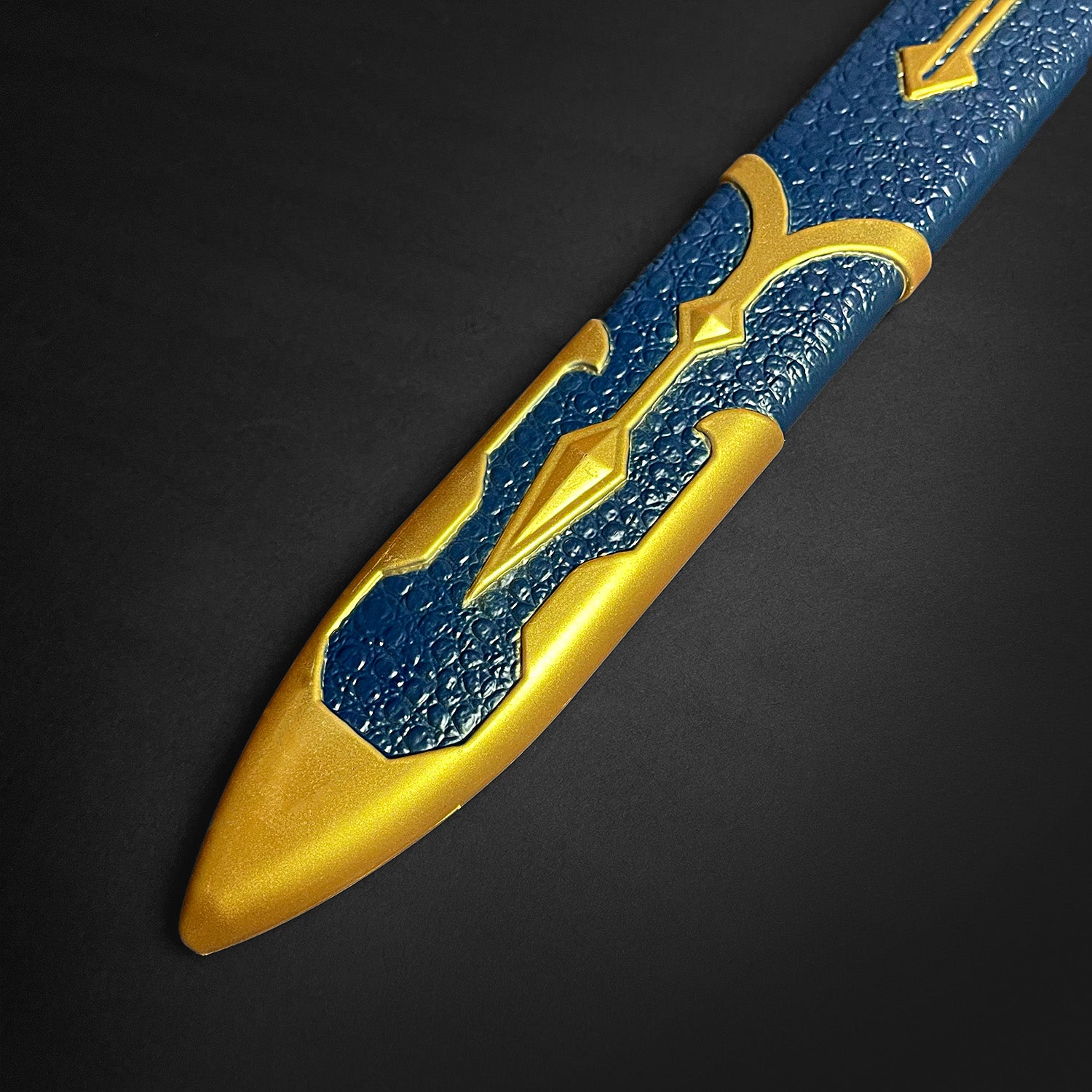 Guild Arms Foam Cosplay Sword with a blue and gold textured design for costume play and cosplay events