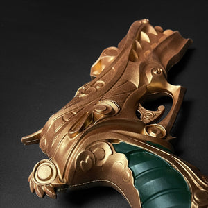 Otaku Gear foam fantasy gun prop in bronze ornate design with green grip and carved fantasy details