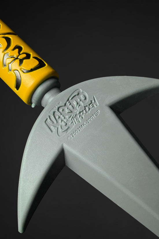 Foam flying thunder kunai foam dagger by Otaku Gears with yellow handle and gray blade detail