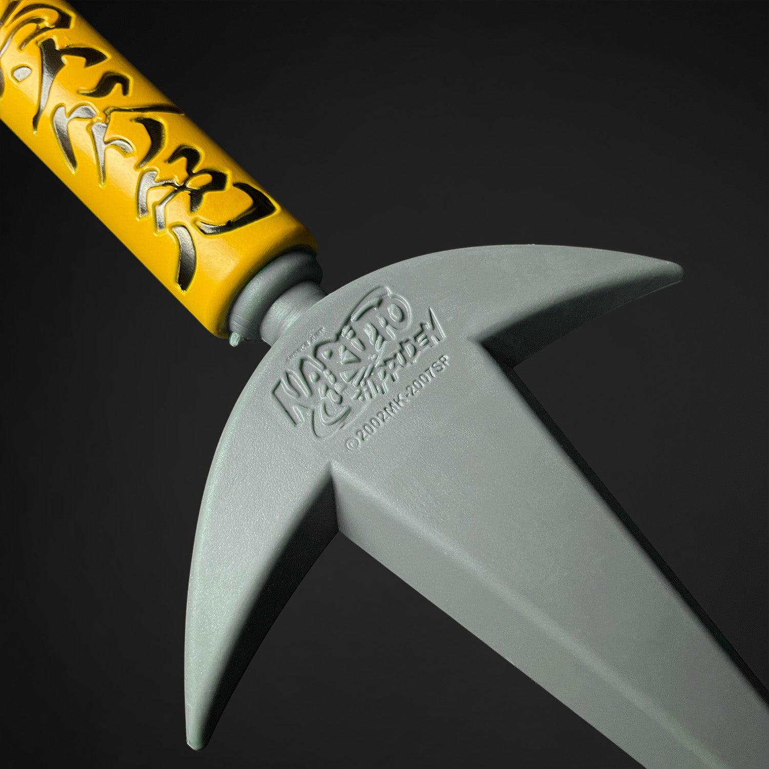 Foam flying thunder kunai foam dagger by Otaku Gears with yellow handle and gray blade detail