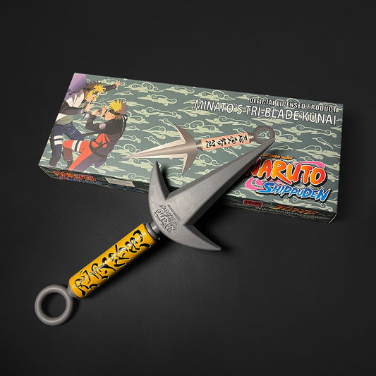 Otaku Gears foam flying thunder kunai with yellow handle and  packaging on black background