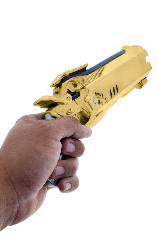Hand holding a Foam Gold Decorative Gun FPS Game with sleek design for gaming enthusiasts