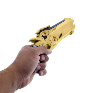 Hand holding a Foam Gold Decorative Gun FPS Game with sleek design for gaming enthusiasts