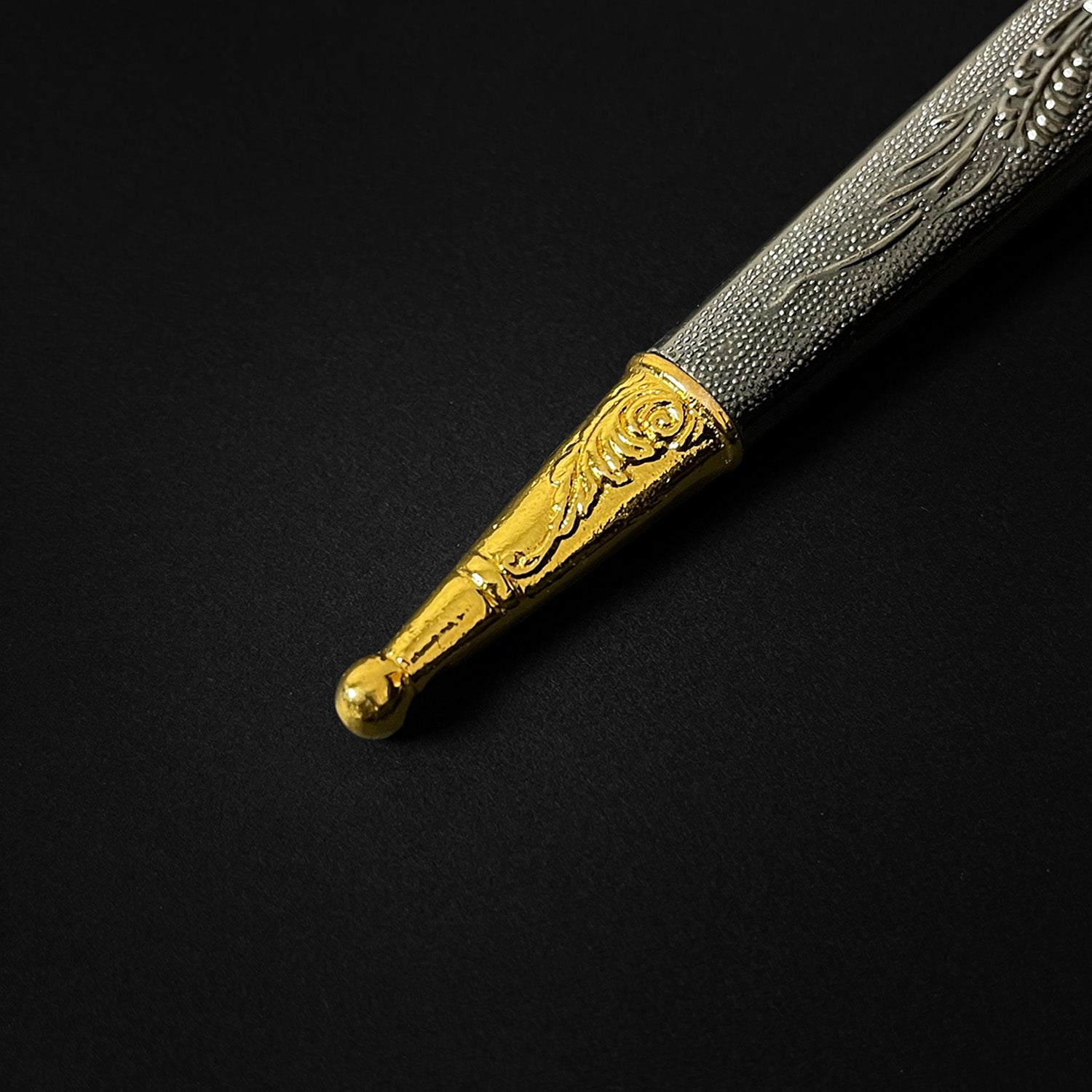 Gold bodice scissors dagger with intricate detailing and sleek design by Guild Arms