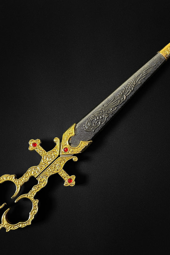 Guild Arms gold bodice scissors dagger with ornate design and red gemstone accents