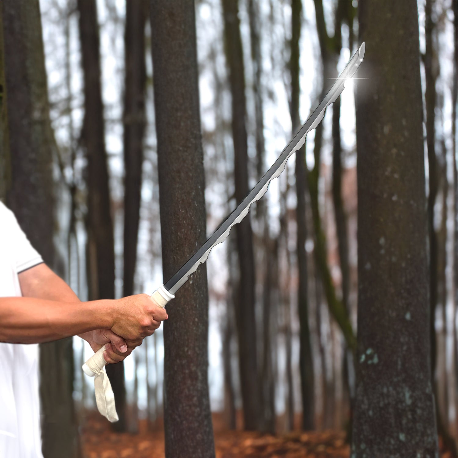 Hand-Forged Demon Anime Sword held in a forest setting, showcasing its detailed craftsmanship