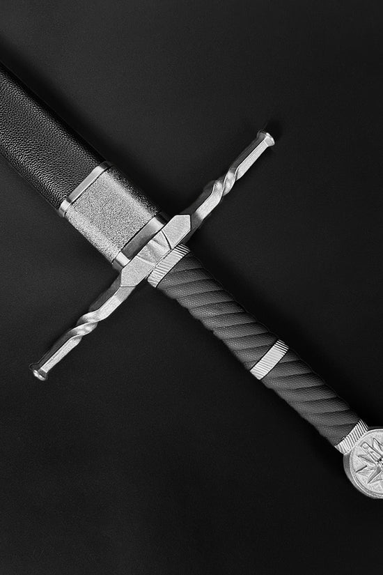 Hand-forged knight medieval sword with a detailed grip and ornate pommel from Knight Collections