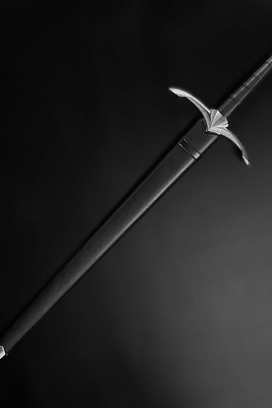 Hand-Forged Medieval Sword w/ Leather Strips featuring a sleek design and detailed craftsmanship