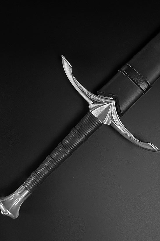 Hand-Forged Medieval Sword w/ Leather Strips featuring a detailed crossguard and sleek blade