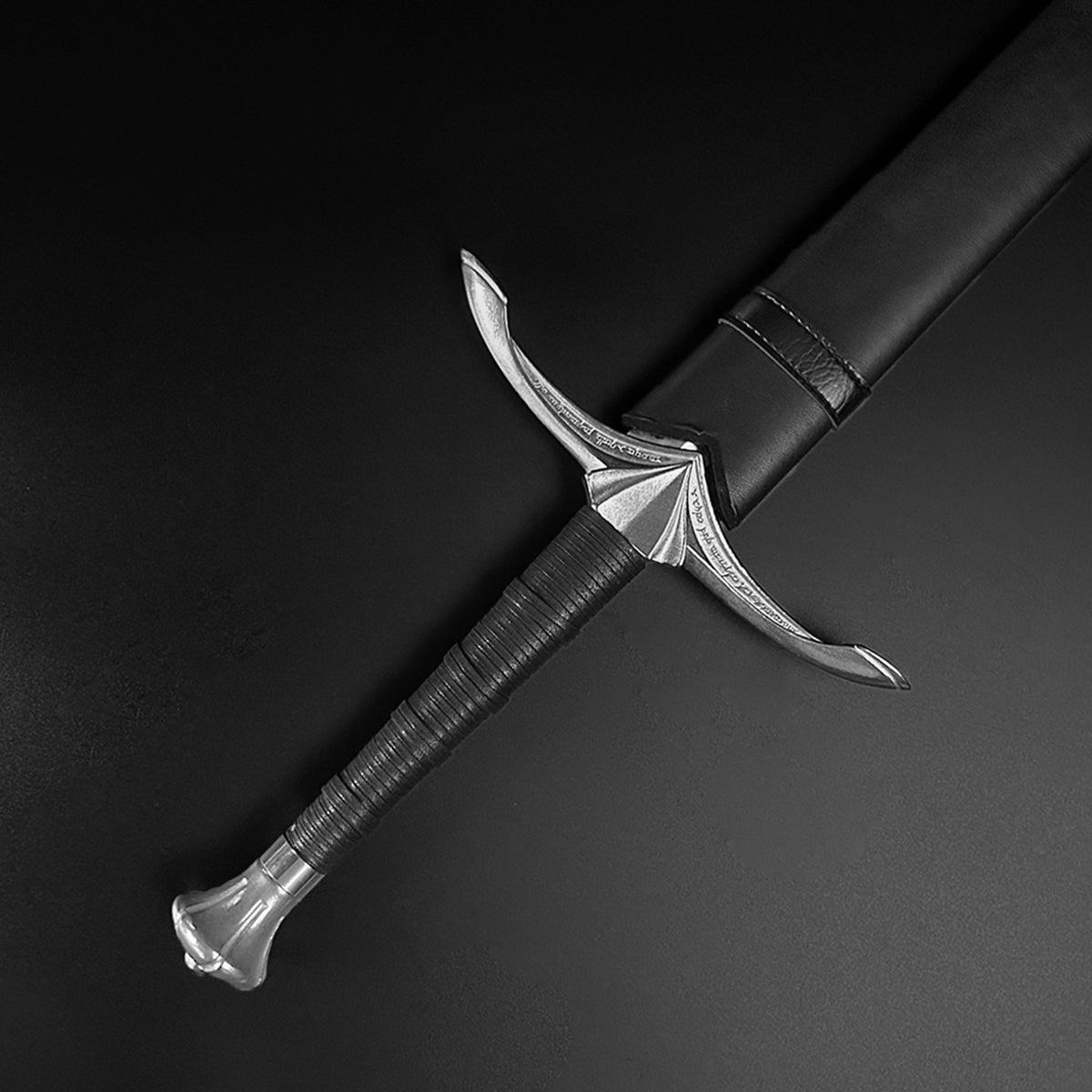 Hand-Forged Medieval Sword w/ Leather Strips featuring a detailed crossguard and sleek blade