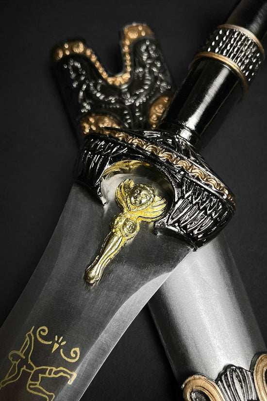 Fantasy Edge Roman dagger with blue crystal ornate black and gold hilt decorative blade for display and cosplay