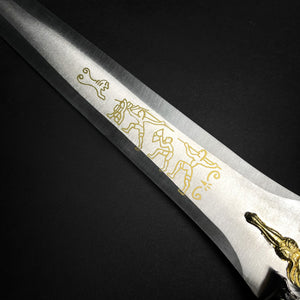 Fantasy Edge medieval dagger blade closeup with gold etching and ornate hilt detail Roman dagger with blue crystal