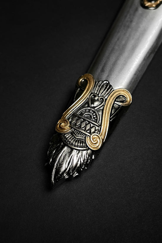 Fantasy Edge Roman dagger with blue crystal ornate silver blade and gold filigree handle close up