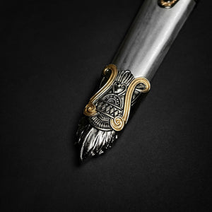 Fantasy Edge Roman dagger with blue crystal ornate silver blade and gold filigree handle close up