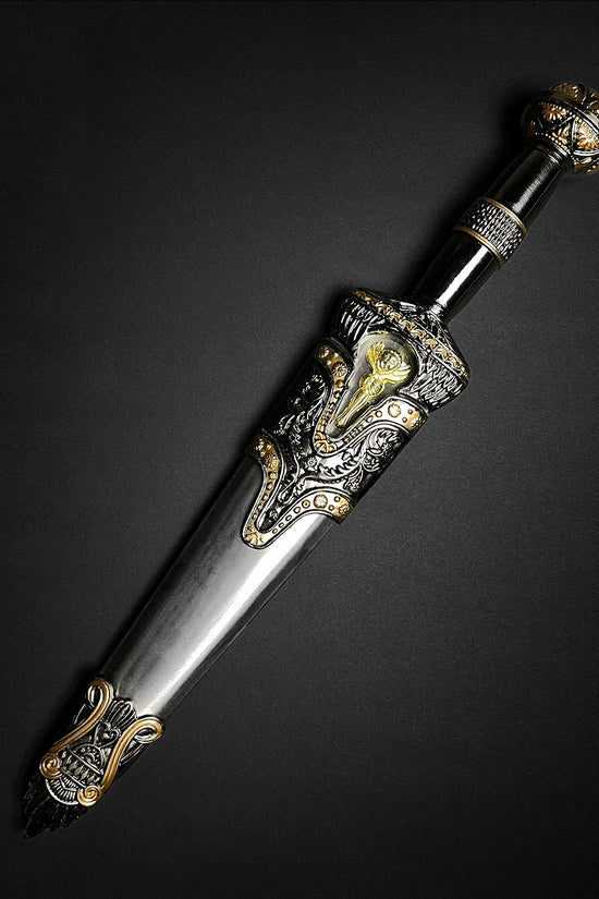 Fantasy Edge ornate medieval dagger in engraved sheath with gold accents and Roman dagger with blue crystal