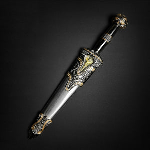 Fantasy Edge ornate medieval dagger in engraved sheath with gold accents and Roman dagger with blue crystal