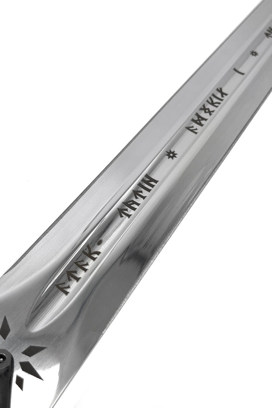 Close-up of the King's Medieval Sword LARP with detailed blade engraving and sturdy grip