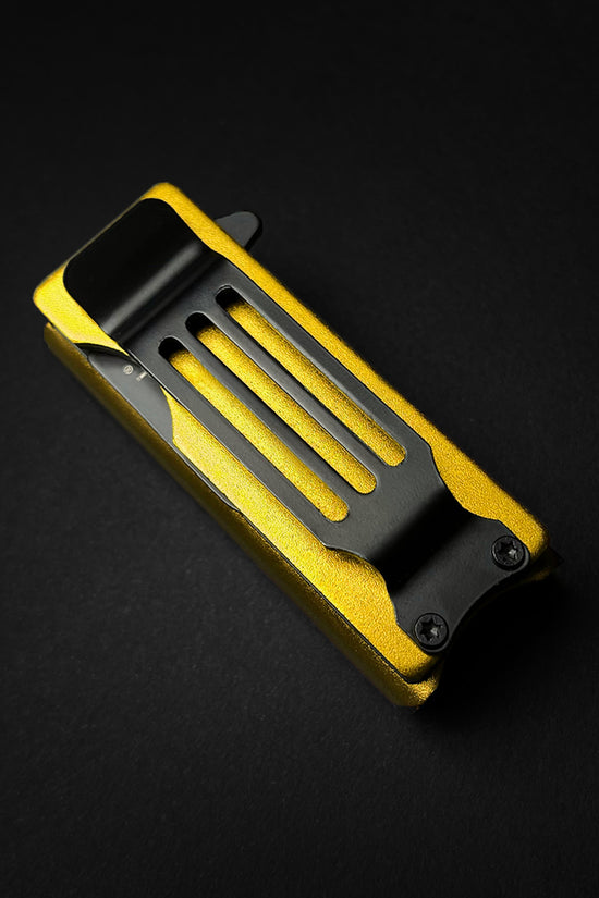 Guild Arms knife lighter case 4.5 inch in yellow with black clip on dark background
