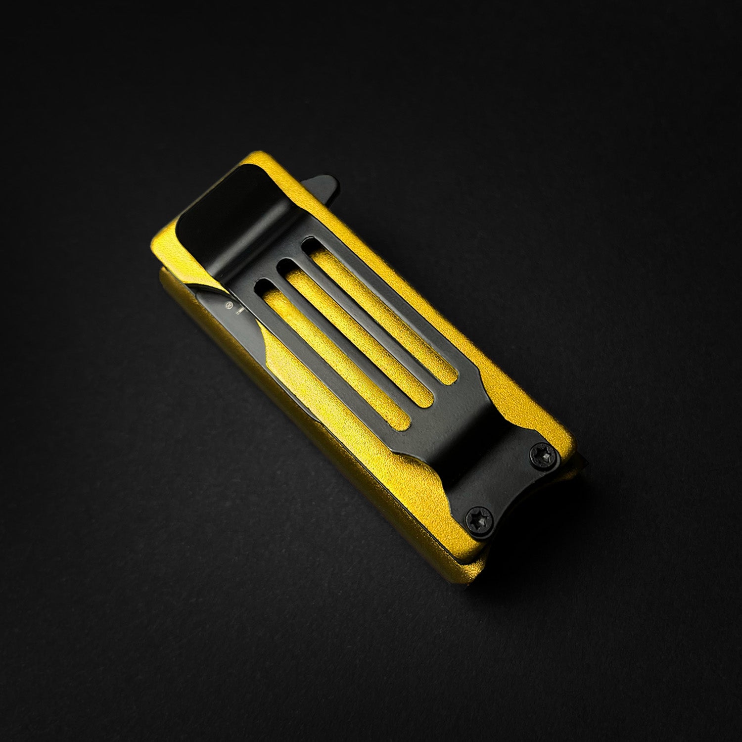 Guild Arms knife lighter case 4.5 inch in yellow with black clip on dark background