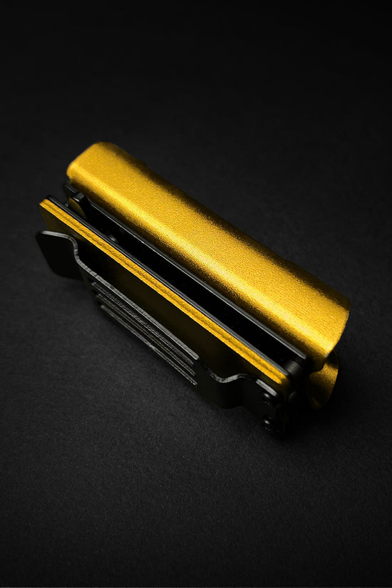 Guild Arms knife lighter case 4.5 inch folding with gold and black design on black background