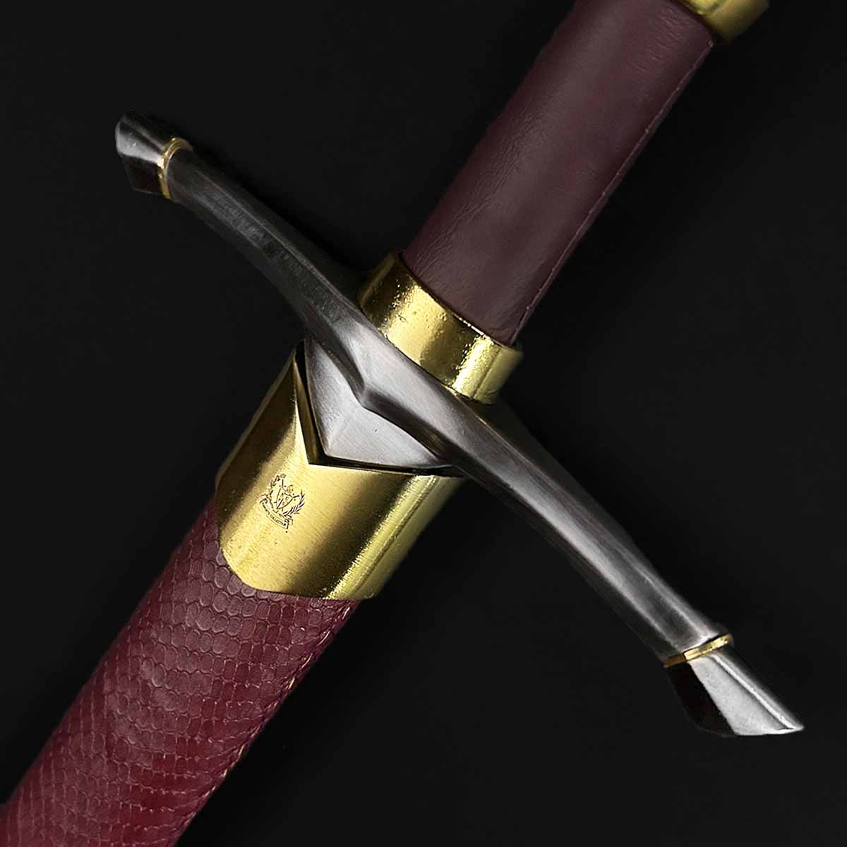 Knight's Collection 'Chimera' Medieval Sword with detailed hilt design and burgundy grip