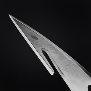 Close-up of a large hunting knife blade by Guild Arms with a sharp tip and sleek design