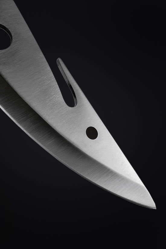 Close-up of a Large Hunting Knife blade from Guild Arms showcasing its sharp edge and design