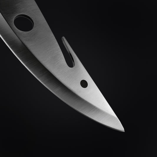 Close-up of a Large Hunting Knife blade from Guild Arms showcasing its sharp edge and design