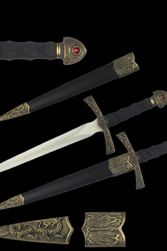 Fleur de lis medieval dagger by Fantasy Edge with ornate handles and decorative sheath