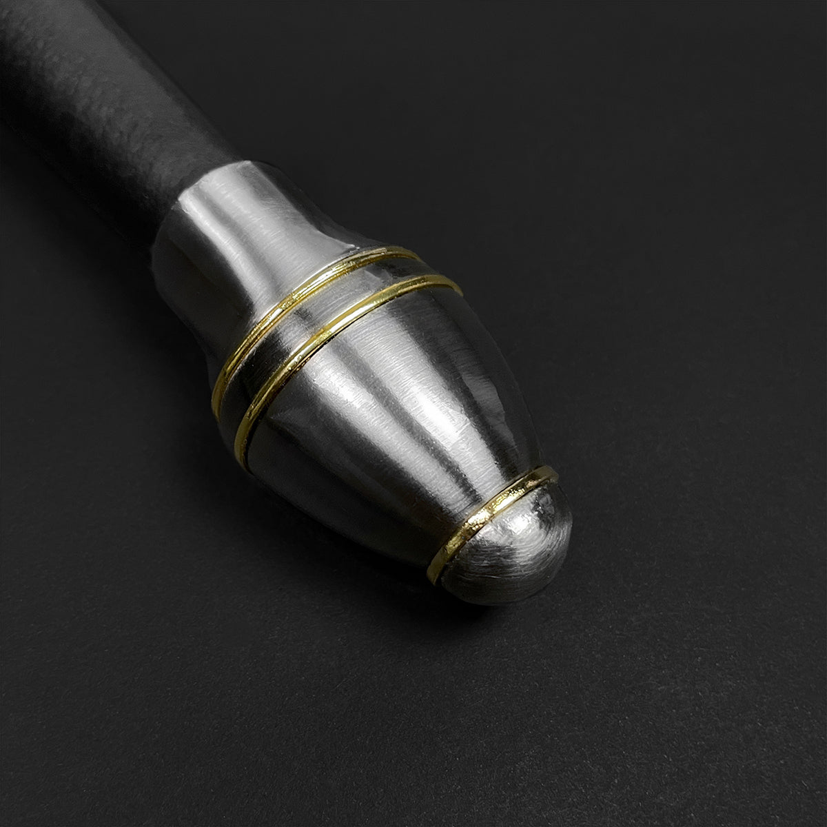 Close-up of a medieval knight one hand sword for sale by Guild Arms featuring decorative detailing on the hilt