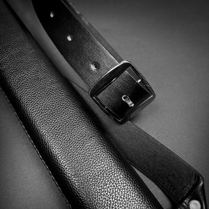 Black leather sword sheath with adjustable belt, ideal for displaying a medieval sword for sale