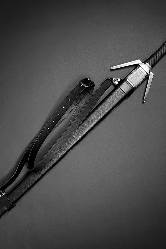 Guild Arms medieval sword for sale with a detailed hilt and scabbard for collectors and enthusiasts