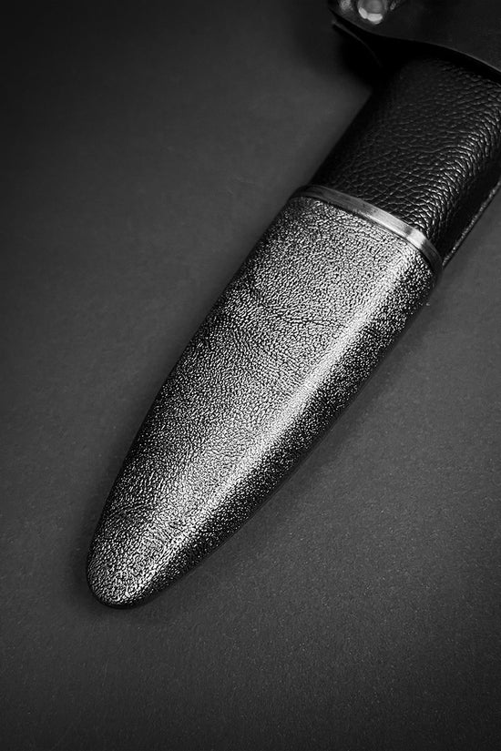 Guild Arms medieval sword for sale with a detailed textured handle and sleek blade design