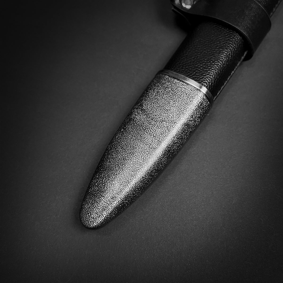 Guild Arms medieval sword for sale with a detailed textured handle and sleek blade design