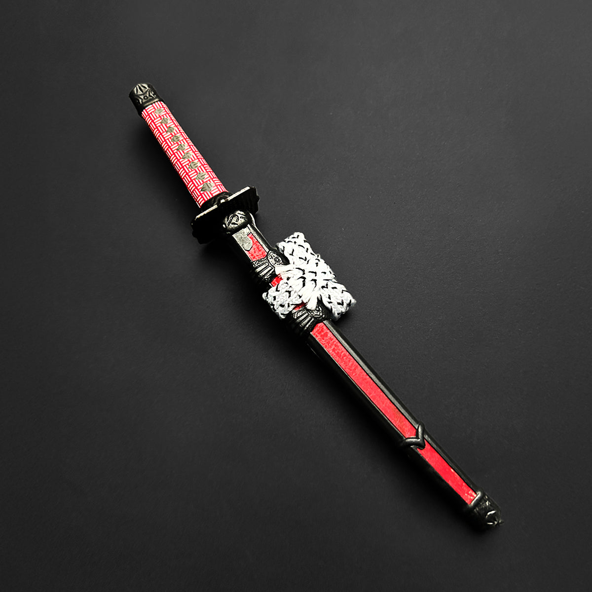 Unique mini katana letter opener with decorative handle and sleek design for stylish correspondence